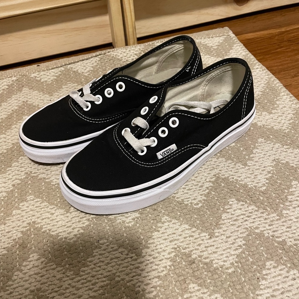 Black and white Vans Authentic shoe